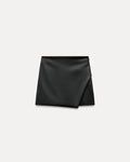 ASYMMETRIC FAUX LEATHER SKORT